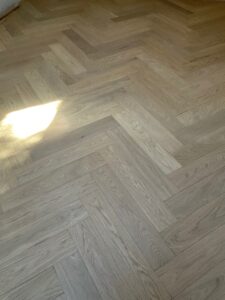 Allwood Group Champagne in chevron pattern. Sustainably engineered European White Oak