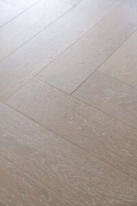 Fabrica Herringbone flooring in Bastille- Photo Logan Havens