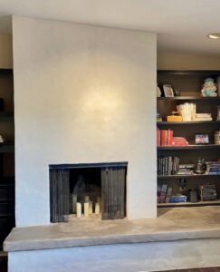 American Clay Forte White fireplace and Porcelina hearth in Capitol Lake