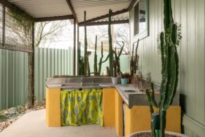 Salvaged stainless steel sink at EcoSense Sustainable Landscaper's Offices- Photo by Logan Havens