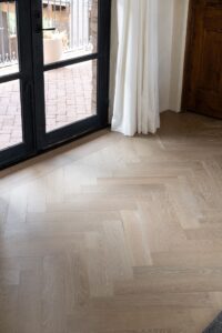 Fabrica Herringbone flooring in Bastille- Photo Logan Havens