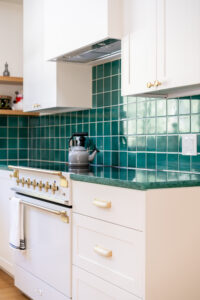 Redrock Tileworks backsplash and Glass2 Aquamarine Countertops, photo by Logan Havens