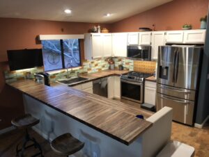 Sustainable Northwest Wood Walnut Countertops and Bedrock recycled glass tile backsplash