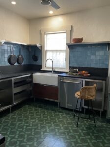 Slate Paperstone Countertops and Fireclay Tile backsplash in Caribbean